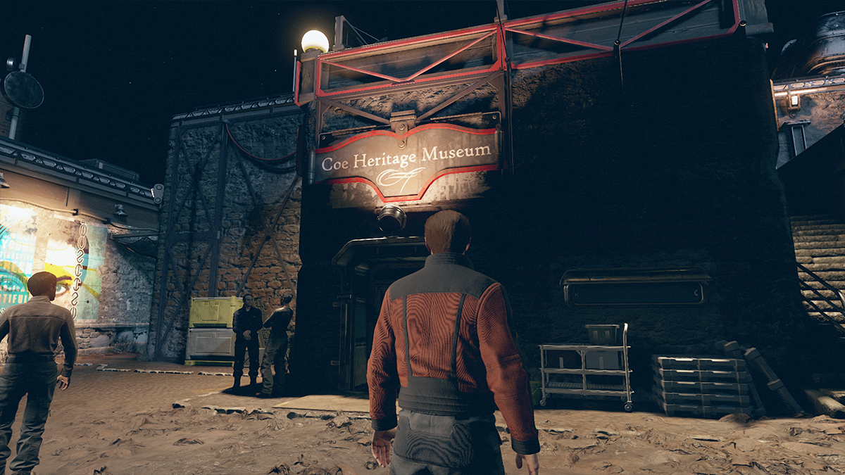 A man stands outside an old brick building in Starfield. 