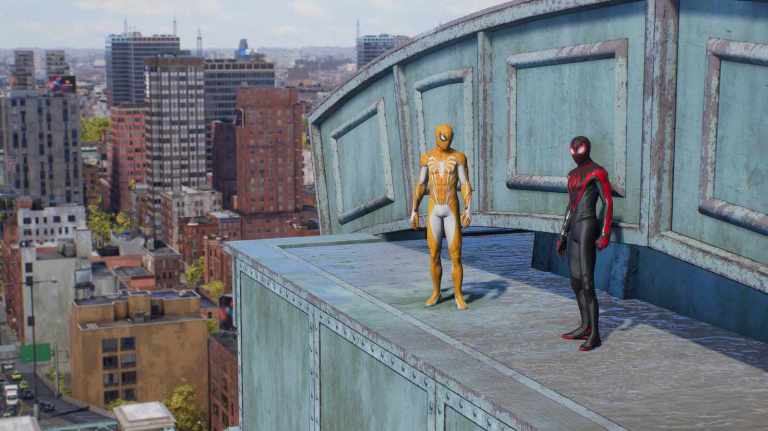 Peter and Miles standing on a bridge chatting