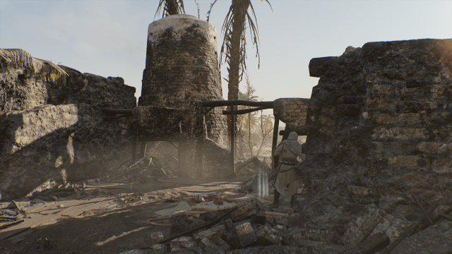 Image of a man in a white robe standing in a burned home.