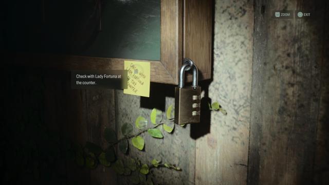 A combination lock with a post-it beside it saying 'Check with Lady Fortuna at the counter'