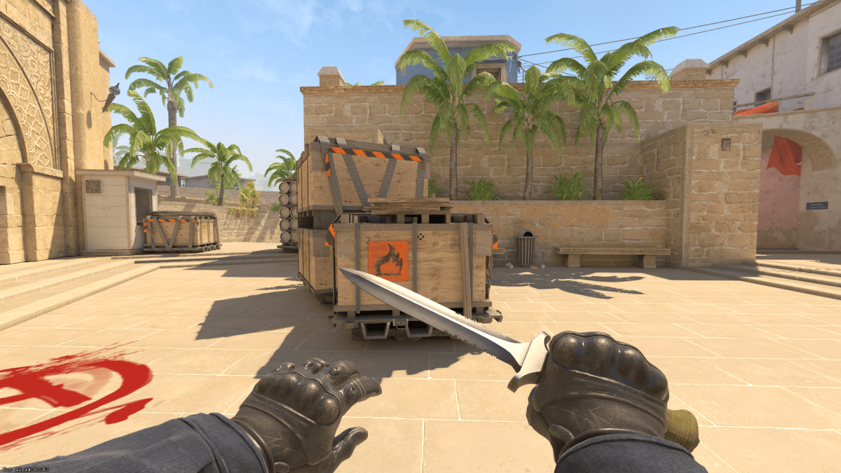 Screenshot taken of CS2 player holding a default knife in front of Mirage's Triple Box on Bombsite A.