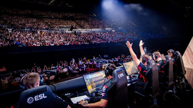 Photo taken of FaZe Clan's CS2 team playing a IEM Sydney match in front of the crowd.