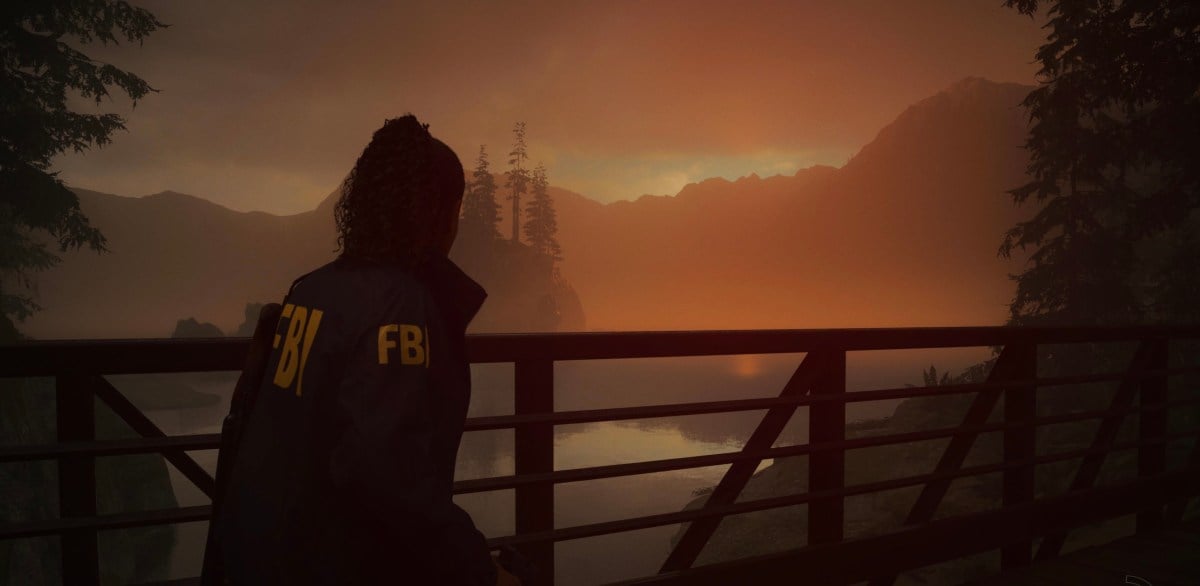 An in game screenshot of Saga Anderson at Cauldron Lake from the game Alan Wake II.