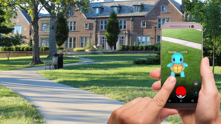 A Pokemon Go player playing near a mansion