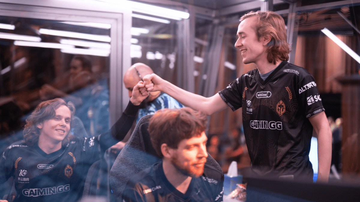 Quinn and dyrachyo fistbumping after a big Gaimin Gladiators win at TI12.