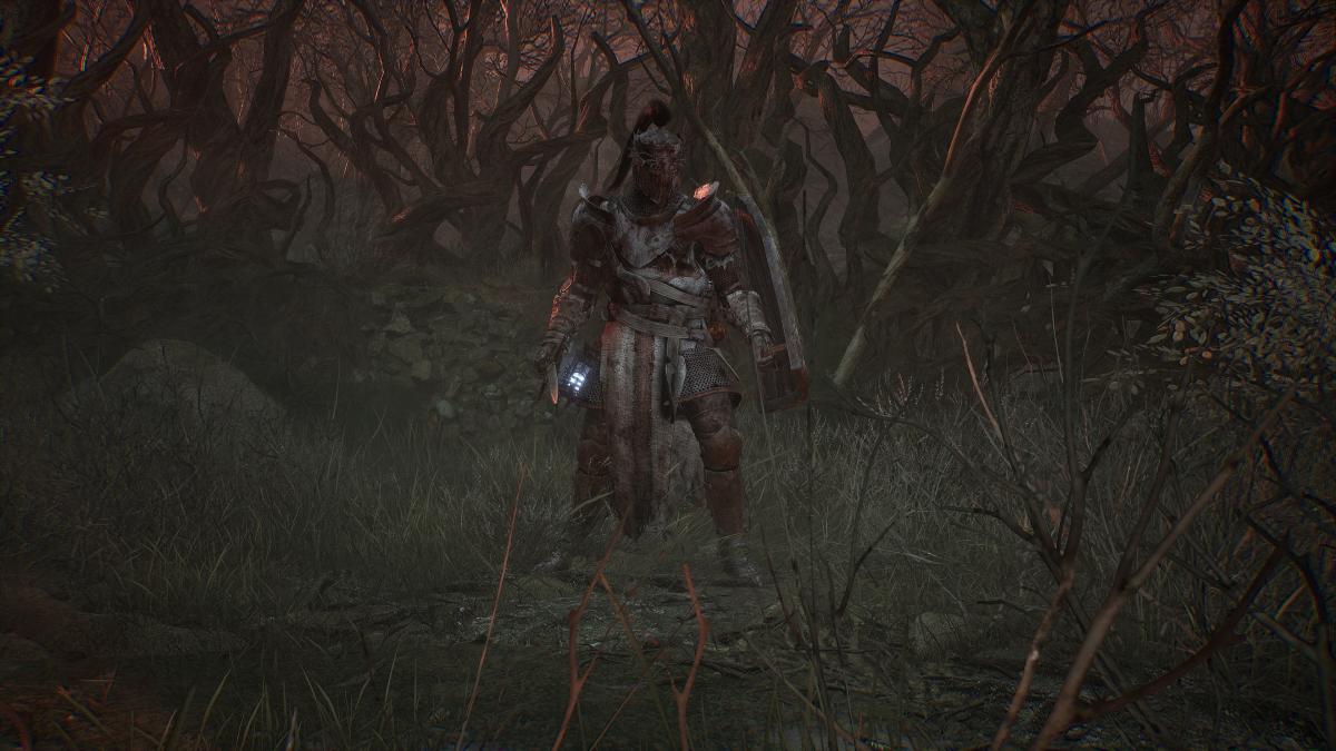 A character in Lords of the Fallen standing in a barren field.