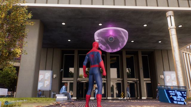 Spider-Man at the Modern Art Museum with a Spider-Bot hanging from a roof