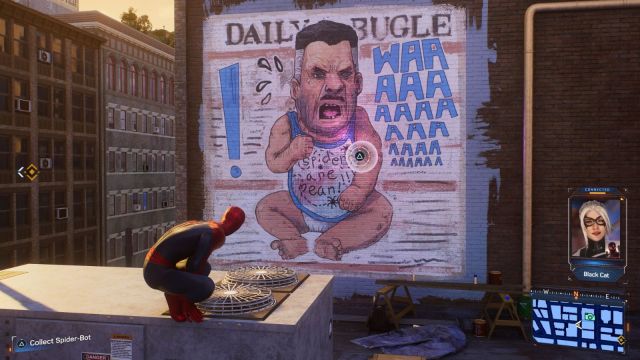 Spider-Man and street art depicting J. Jonah Jameson as a baby