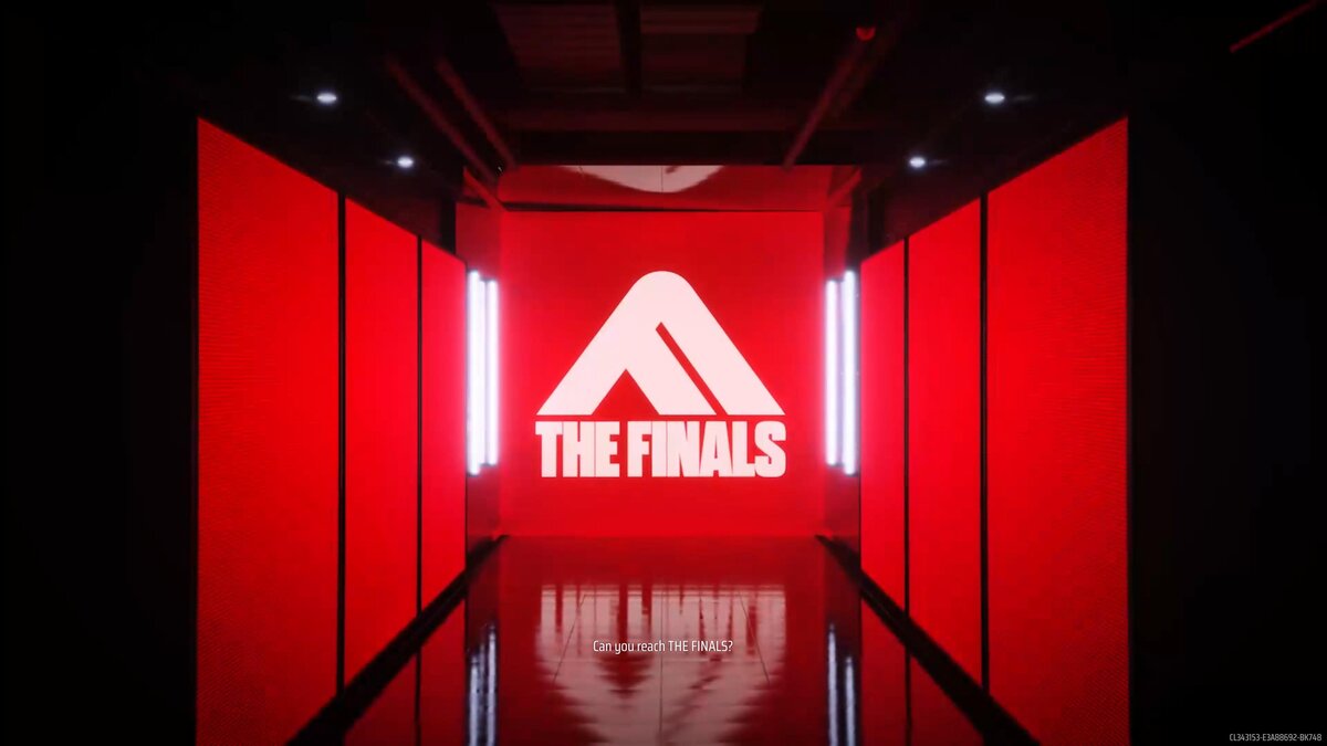 A hallway with screens lit up in red with THE FINALS logo.