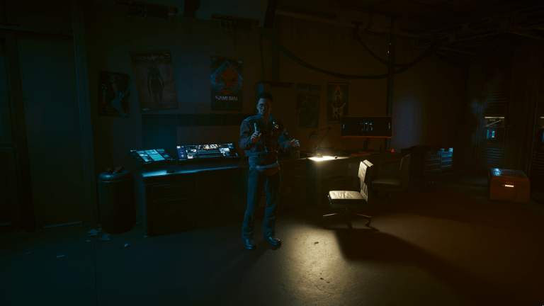 A character in Cyberpunk at their desk.