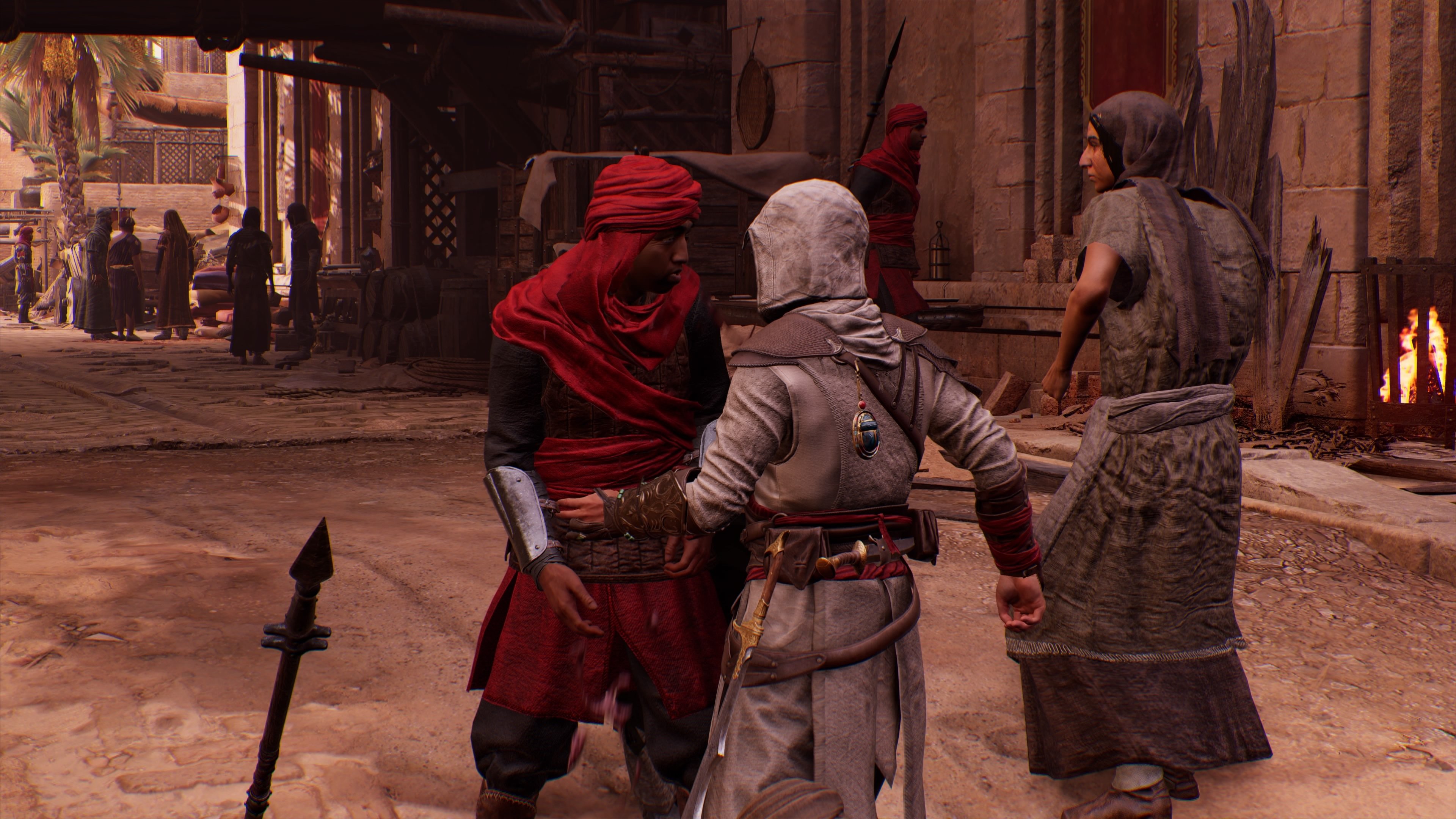 Basim kills a guard in Assassin's Creed Mirage with his followers as cover.