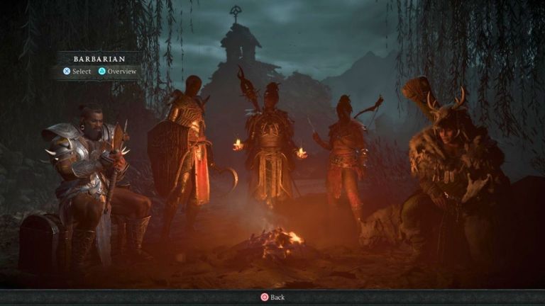 Five different classes in Diablo 4 sitting around a campfire