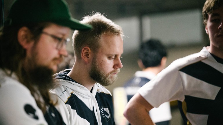 Boxi, a player for Team Liquid, stands in the center with his Team Liquid teammates at Dota 2's The International tournament in Singapore in 2022.