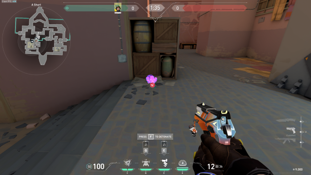 A Nanoswarm Grenade is placed directly on top of an Alarmbot in a Killjoy setup for Bind's A site.