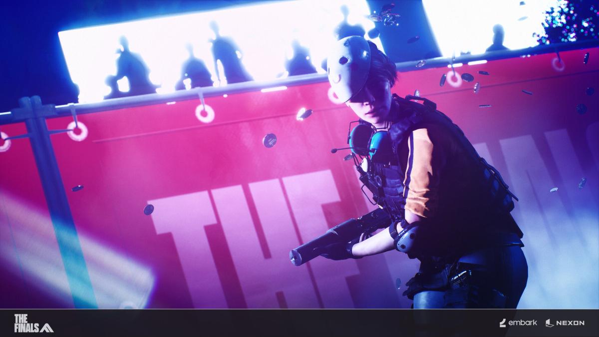 THE FINALS contestant standing in front of an audiencce