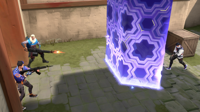 VALORANT agent Iso using Contingency, a tall purple bullet-blocking sheild.