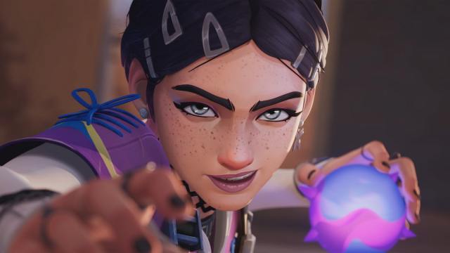 A close up of Clove in valorant about to throw an ability