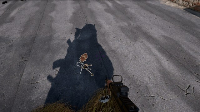 Secret Room Key in PUBG, found on asphalt.