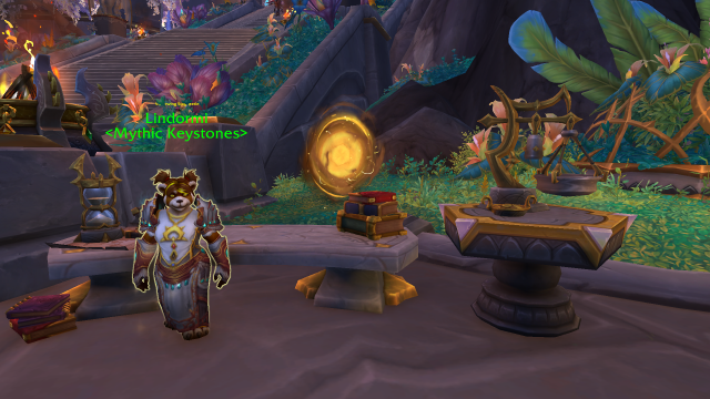 Female Pandaren standing next to a portal in Valdrakken