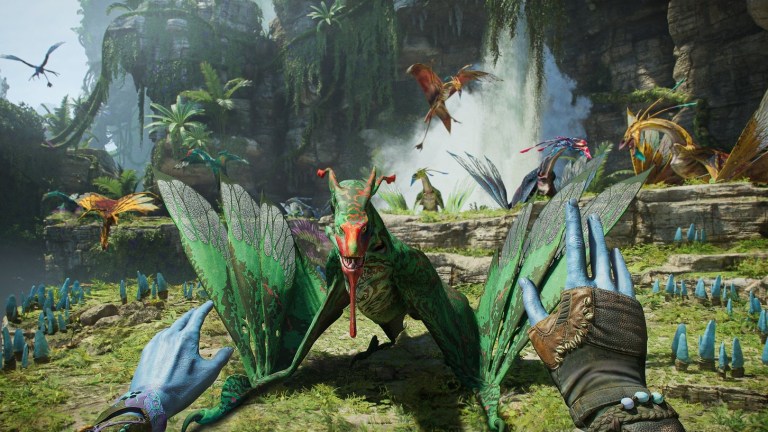 A Na'vi character in Avatar: Frontiers of Pandora extending their hands towards an Ikran.