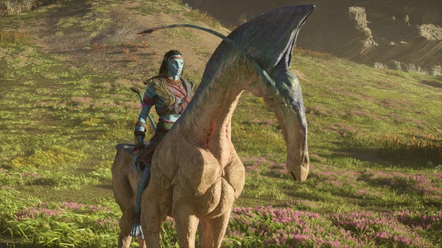 A Na'vi riding a direhorse mount in avatar: frointers of pandora