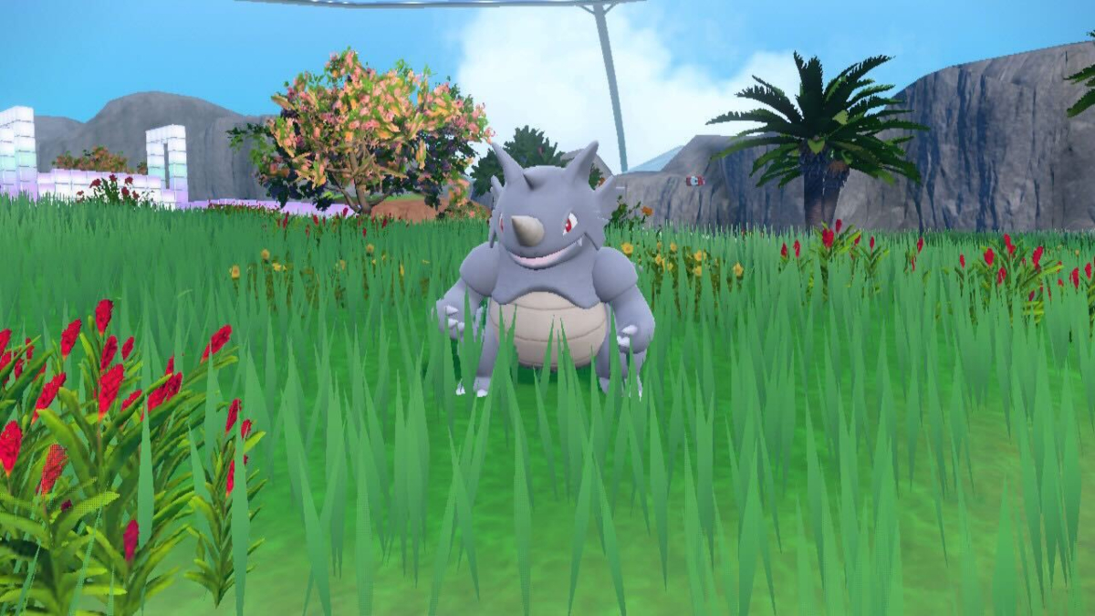 Rhydon standing in the grassland in The Indigo Disk.