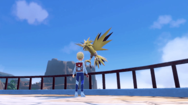 Zapdos flying above a trainer in Pokémon Scarlet and Violet