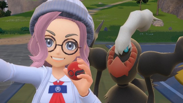 Trainer taking a selfie with Darkrai in Pokémon Scarlet and Violet