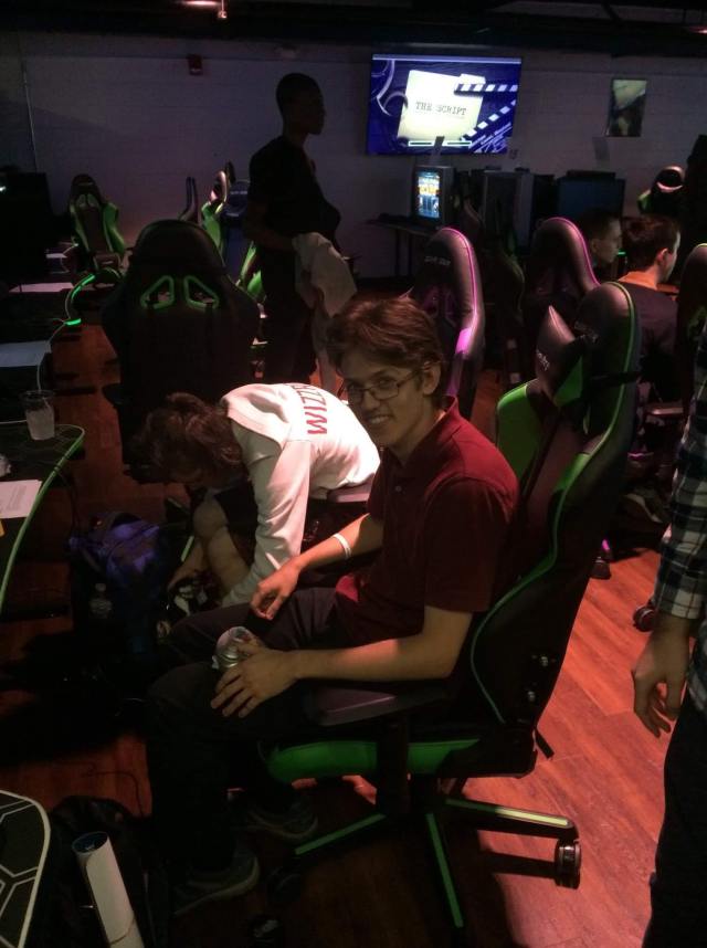 Eddie Halpin sitting on a gaming chair in VGBootCamp