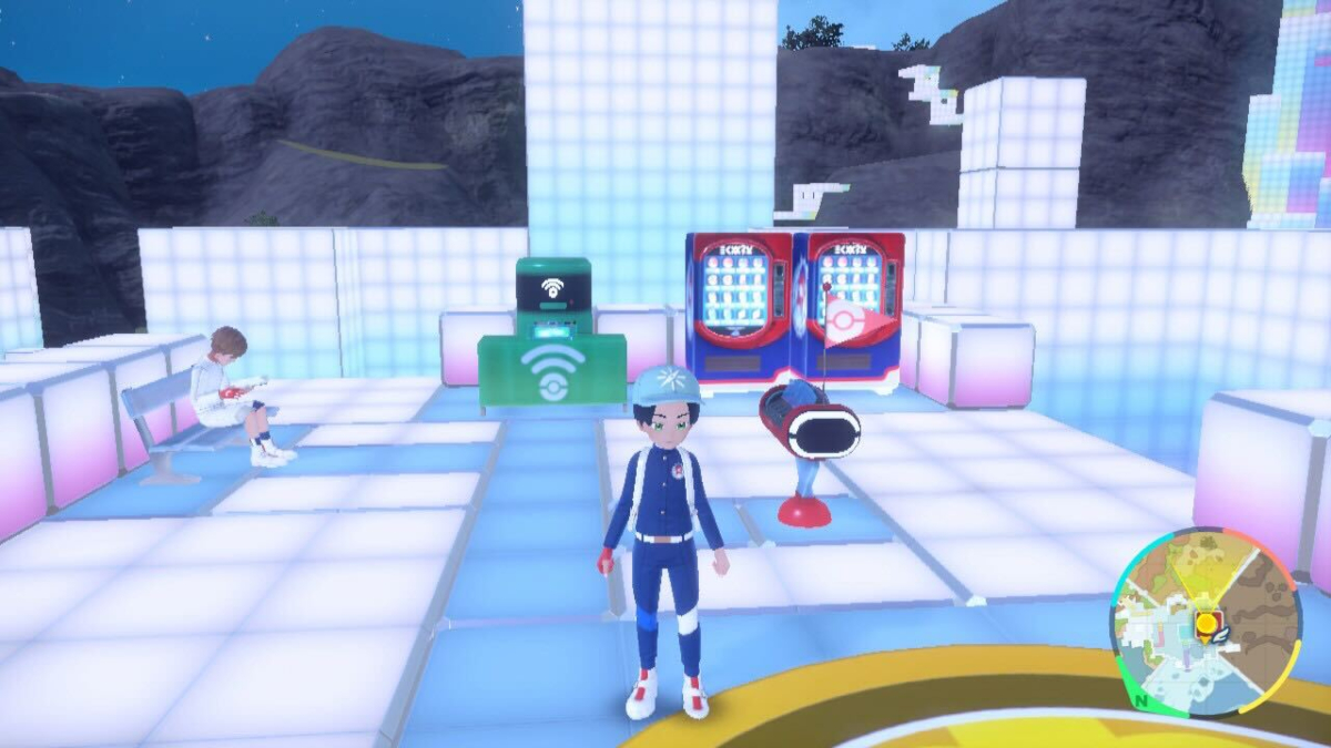 A player stood in front of a TM machine, a healer, and vending machines in The Indigo Disk.