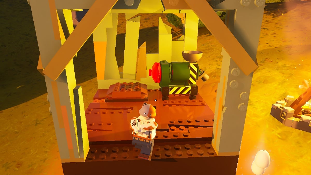 A LEGO Fortnite character standing next to a Grain Mill.