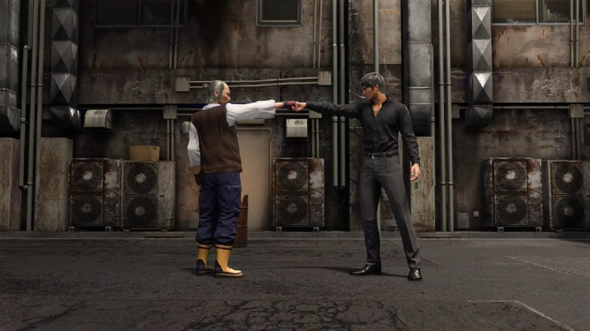 Like a Dragon Infinite Wealth Kiryu fist bumping Komaki