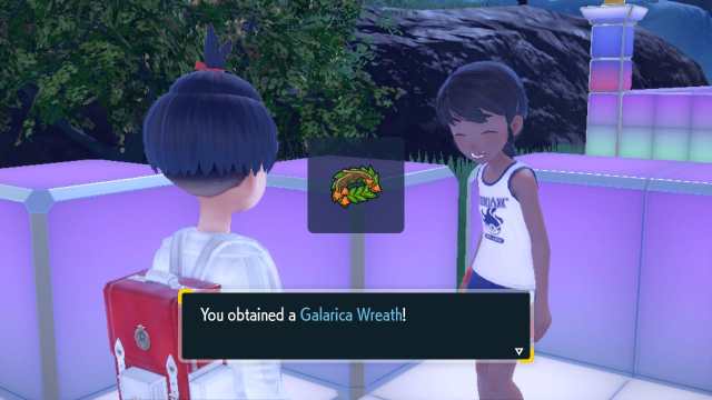 A Pokémon SV NPC handing the player a Galarica Wreath.