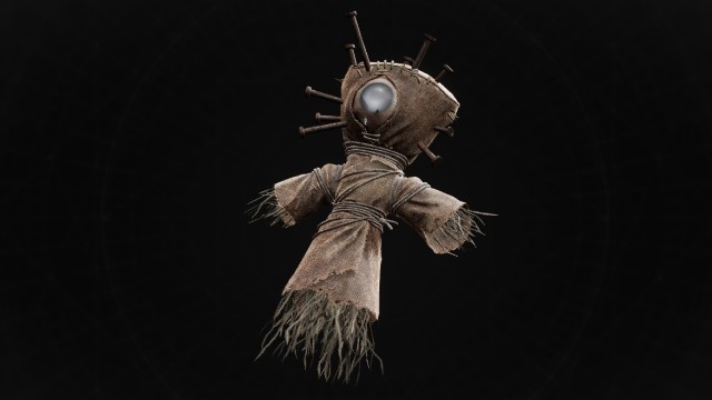 A wicker voodoo doll sits on a black background in Remnant 2.