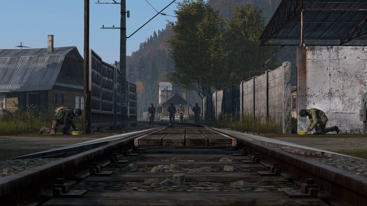 An image of a group of players walking on train tracks from DayZ.