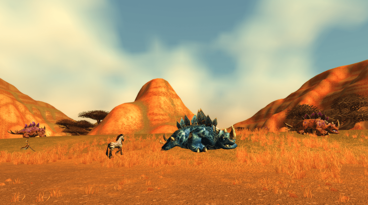 Animals in the fields of the Barrens in WoW Classic. Kodos and Wind Serpents can be seen near Zhevras along the mountainsides.