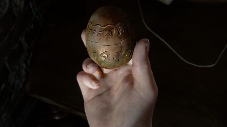 A Precursor Orb being held