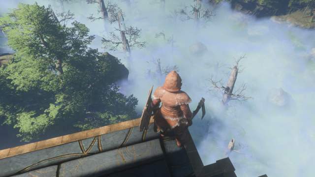 A player stands on a platform above the Shroud in Enshrouded.