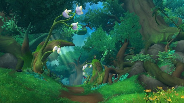 A path in World of Warcraft surrounded with green trees and various flowers.