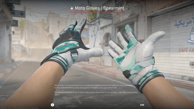 Moto Gloves Spearmint gloves in CS2.