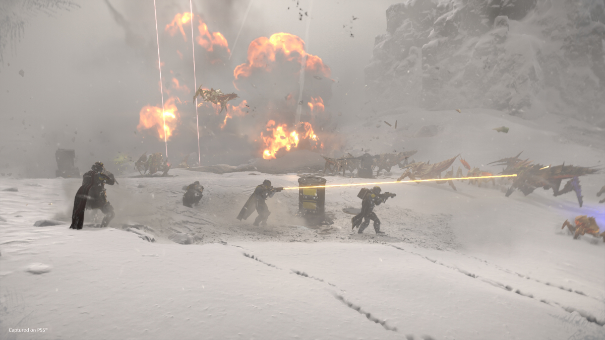 A group of soldiers in a snowy environment fighting.