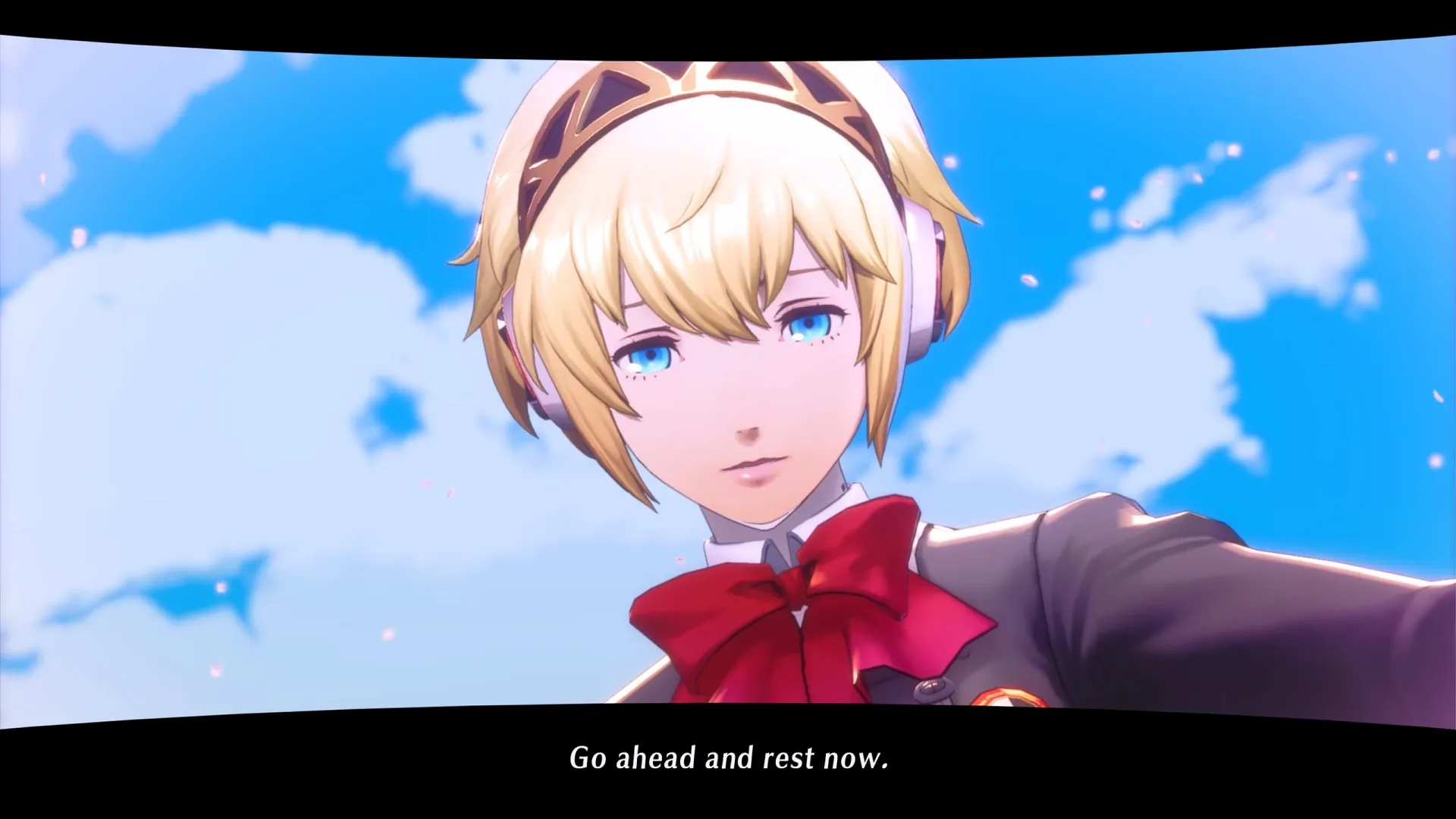 An image of Aigis looking over the Protagonist in Persona 3 Reload.