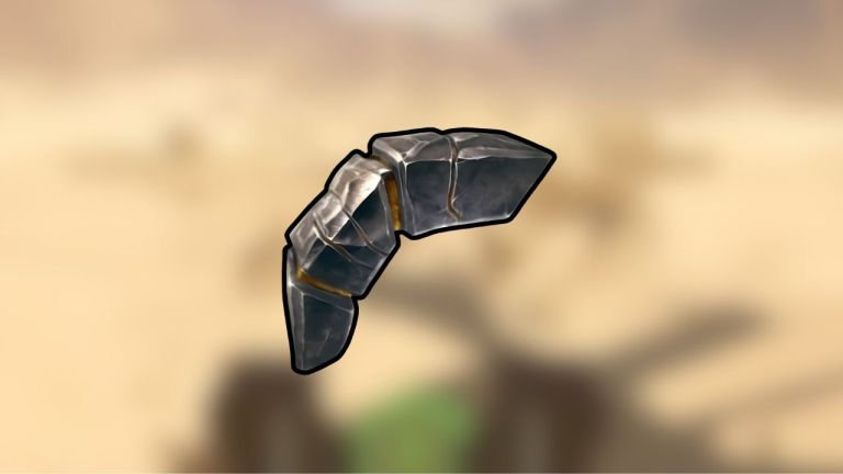 A screenshot of the Golem FInger item in Granblue Fantasy on a blurry desert background.