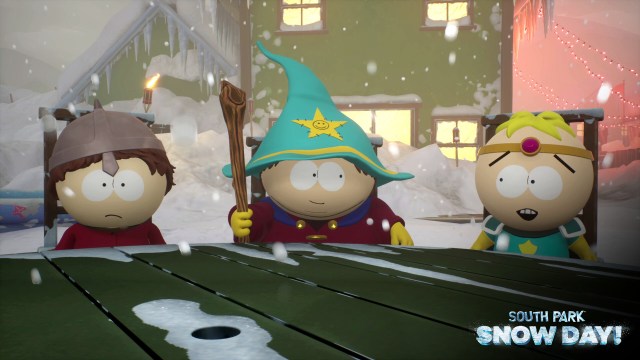 Clyde, Cartman, and Butters sitting at a table. Cartman is wearing a wizards hat.