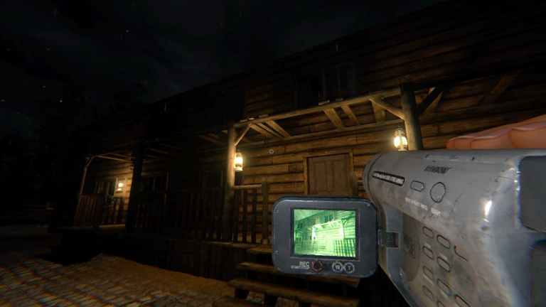 The player recording the outside of Bleasdale Farmhouse using a Video Camera.