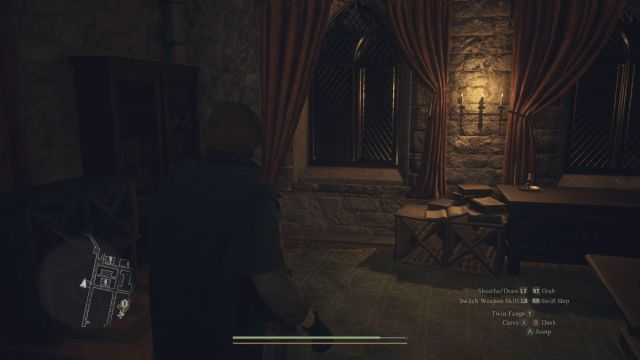 A Dragon's Dogma 2 screenshot that shows the Arisen standing in front of an open window.