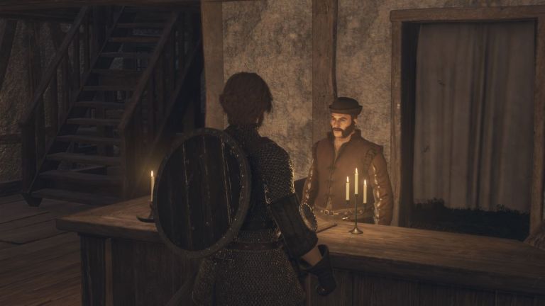 A screenshot of an Arisen speaking with an innkeeper in Dragon's Dogma 2.