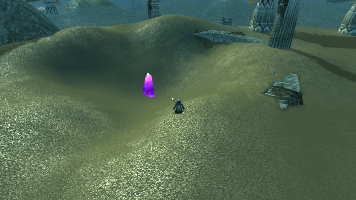 A gnome mage stands in front of an Arcane Crystal on the Zoram Strand in WoW Classic