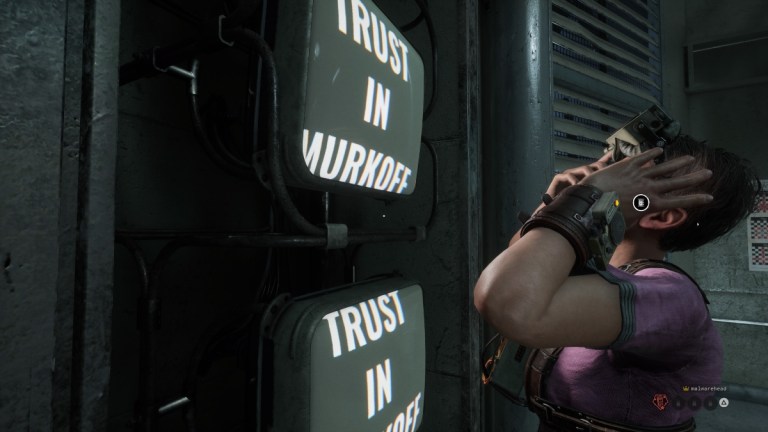 Murkoff Facility participant looking at 'Trust in Murkoff' monitors in The Outlast Trials.