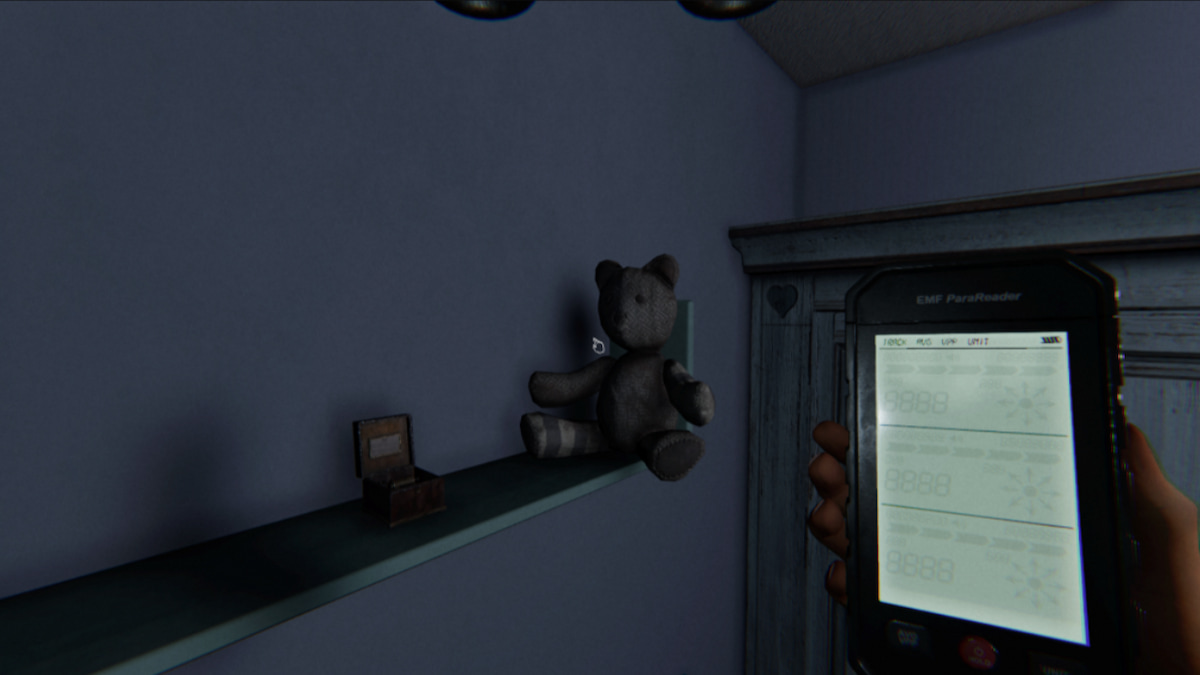 The Music Box Cursed Possessions next to teddy bear on a shelf in Phasmophobia.